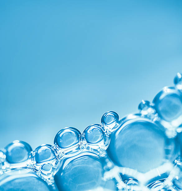 istock close-up of air bubbles on a light blue background. copy space 2247941187