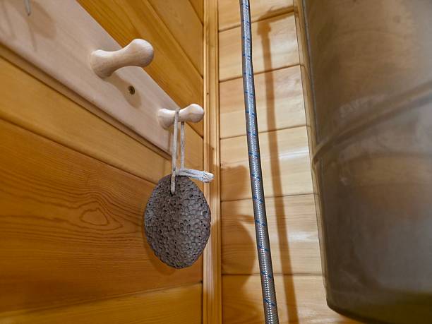 istock Sauna Accessories: Pumice Stone and Wooden Hooks 2247944811