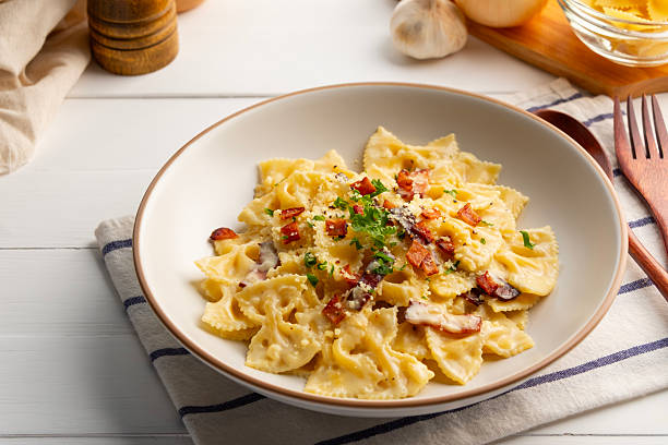 istock Creamy Bow Tie Pasta (Farfalle) Carbonara sauce bacon 2247945400