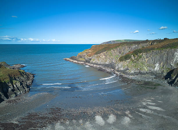 aerial view of a rocky coastline on a bright day