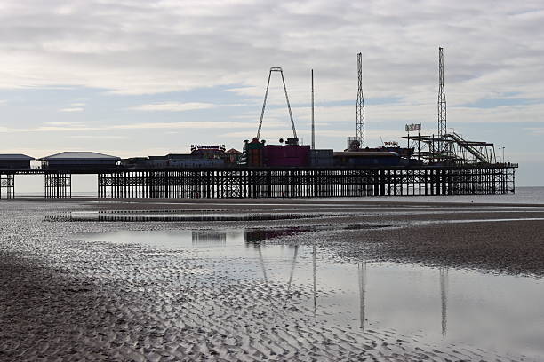 View across a beach to a seaside funfair