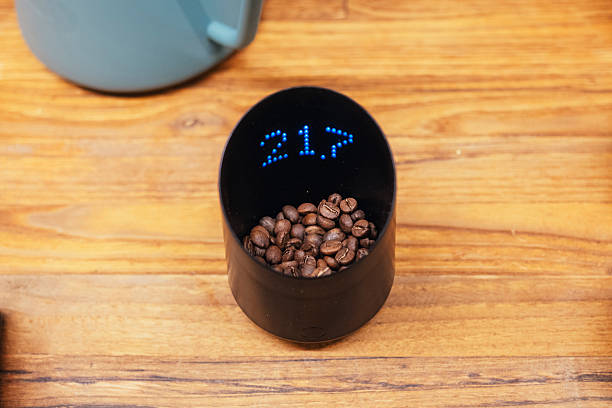 istock Close-up of coffee beans in digital container. 2247953014