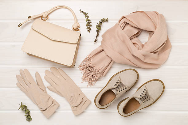 istock Stylish autumn accessories on wooden background, top view 2247955818