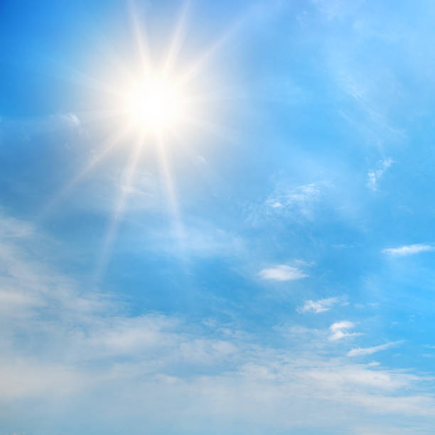 istock Clear sky scene featuring radiant sunlight, visible beams, and soft cloud formations in natural daylight composition 2247956138