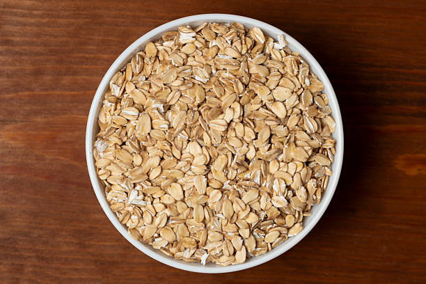 istock Oatmeal. Oat flakes for cooking. 2247959338