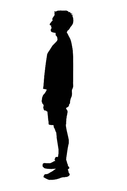 istock silhouette of side view of man standing on white background 2247960945