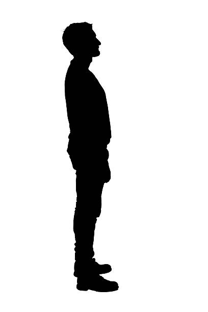 istock silhouette of side view of man standing on white background 2247963875