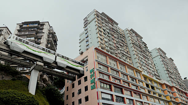 istock Monorail Passing Through Urban Buildings in Chongqing China 2247964449