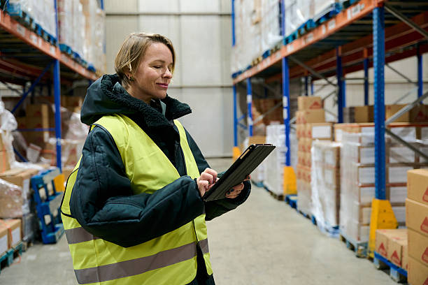 istock Woman managing inventory in cold chain warehouse 2247965955