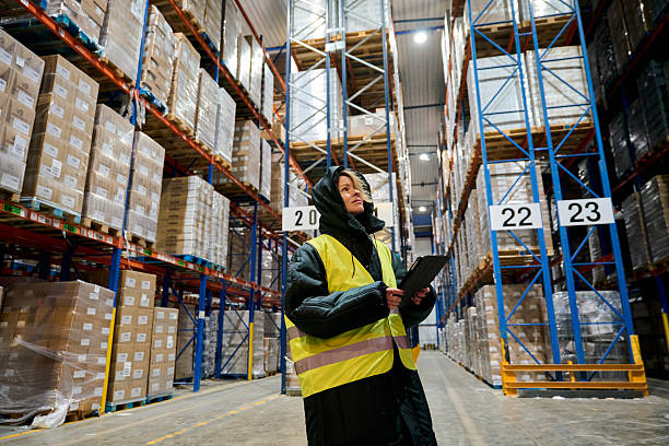 istock Woman working in cold chain distribution warehouse 2247965967