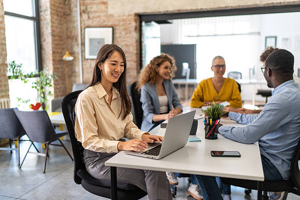 istock Diverse business team collaborating during meeting in modern office 2247966573