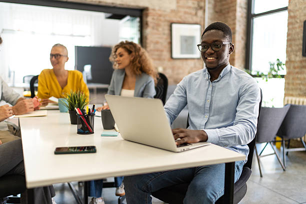 istock Diverse business team collaborating in modern office meeting 2247966625