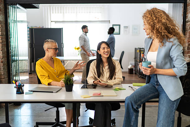 istock Women colleagues collaborating during a modern office meeting 2247966765