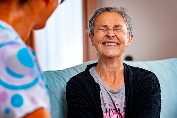 istock Elderly Woman Engaging in Friendly Conversation With Caregiver 2247967277