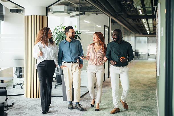 istock Professional colleagues having a conversation on the move 2247973961