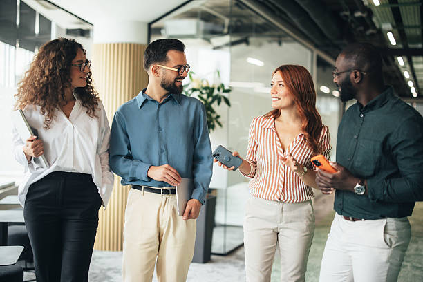istock Professional colleagues having a conversation on the move 2247973964