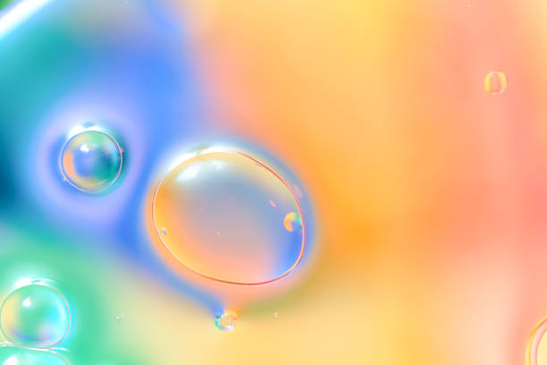 Vibrant Color Fusion Glossy Background: Abstract 3D Bubbles Texture for Modern Cosmetic, Lip Gloss, and Trendy Beauty Product Packaging Design.