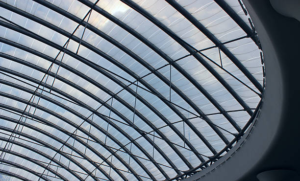 istock Strong frame of a spherical dome in the ceiling of a building that lets in sunlight 2247980764