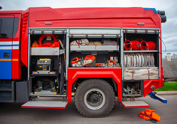 istock Fire truck equipment storage showing firefighting gear, hoses, and tools at an emergency response site 2247980848