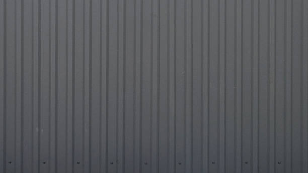 istock Grey corrugated metal sheet siding texture 2247983971