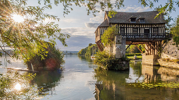 istock Romantic old mill over Seine river in Vernon -  France 2247990983
