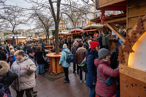 Crowd at a Christmas German market during a winter day in Quebec city