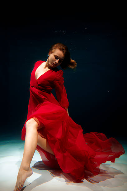 istock Submarine sad muse, Oceanic melancholic muse immersed in red 2247992937