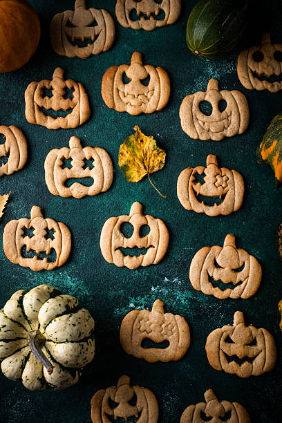 istock Halloween cookies in shape of jack-o-lantern 2247992938