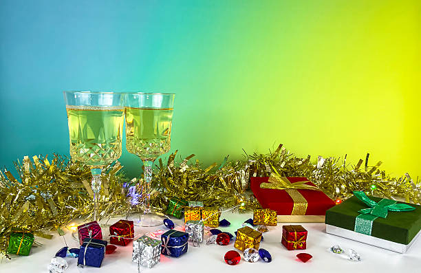 The gift wrapped in shining gold ribbon is full of joyful atmosphere