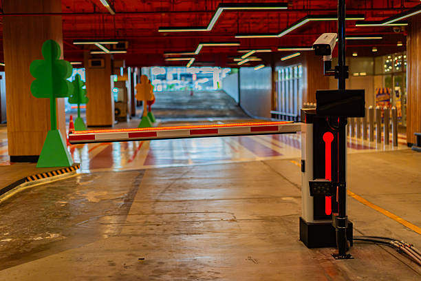 istock Barrier gate for entrance to car park in building 2248015212