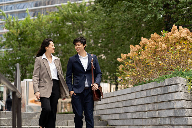 istock Two asian people going to work in the city 2248016549