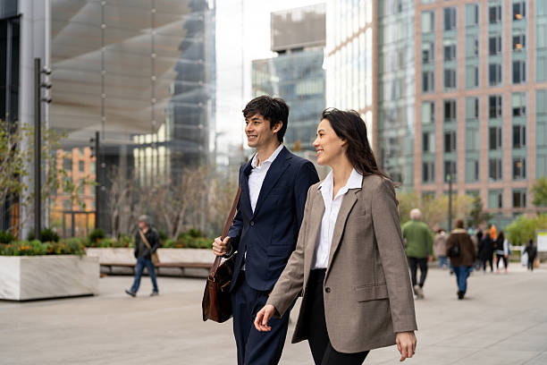 istock Two asian people going to work in the city 2248016569