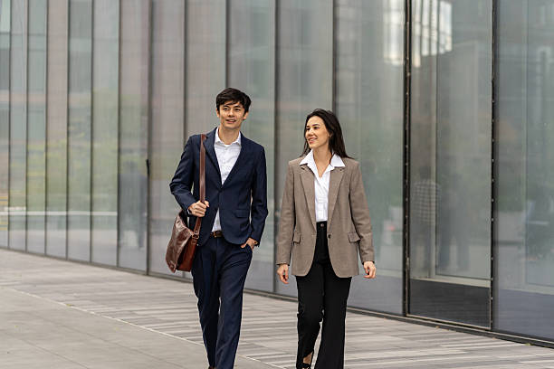 istock Two asian people going to work in the city 2248016582
