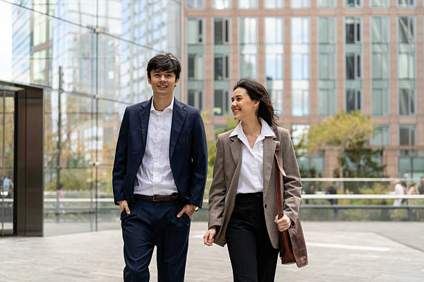 istock Two asian people going to work in the city 2248016600