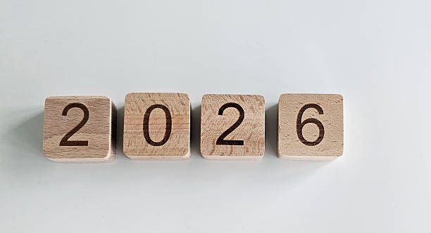 istock Wooden blocks displaying the year 2026 arranged neatly on a light surface concept 2248021779