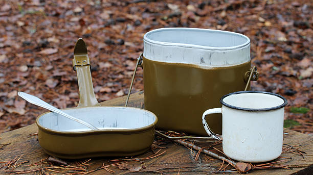 istock Military mess kit with spoon and cup outdoors 2248022333