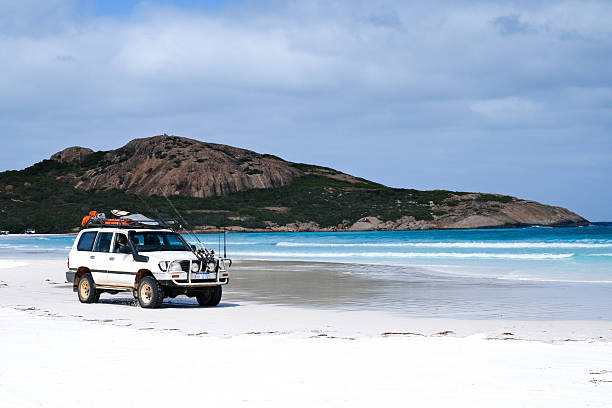 White 4WD car in Wharton Beach, Esperance, Western Australia