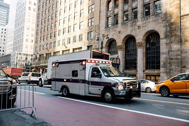 istock Emergency vehicle responding through busy urban street 2248026246
