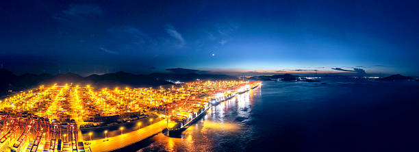 Aerial view of container ships at night