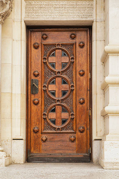 istock Painted wooden door with ornaments 2248027871