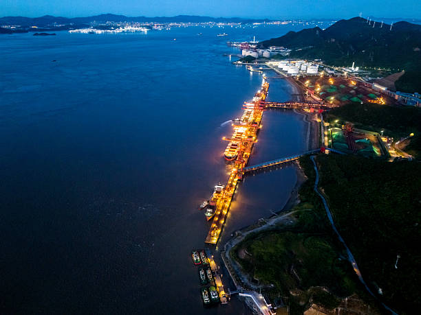 Aerial view of container ships at night