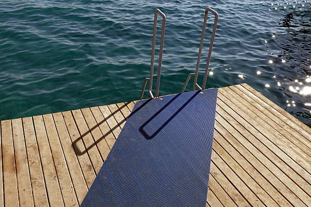 The descent into the sea from the platform is the moment when the border between the land world and the water element becomes especially noticeable and exciting. It's not just entering the water, it's a ritual filled with anticipation and anticipation.