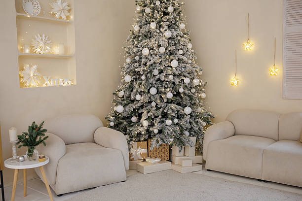 istock Minimalist Christmas living room interior with decorated tree and gift boxes 2248032865