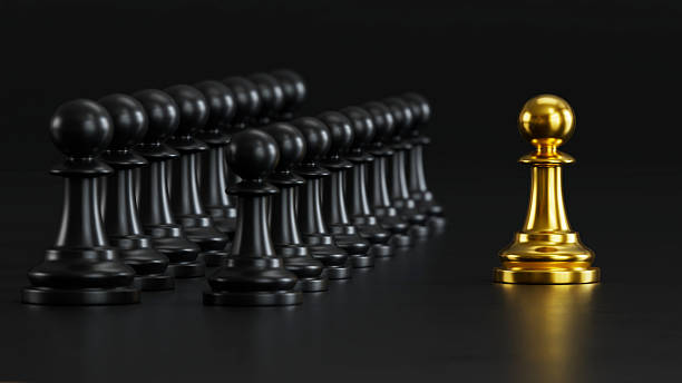 istock Golden Chess Leads Black Pawns: Embodying Versatile Power & Strategic Victory 2248035595