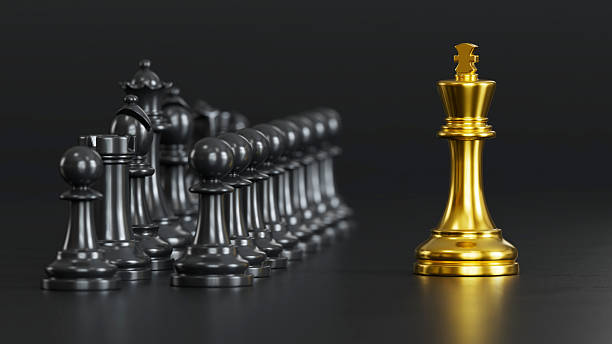 istock Golden Chess Leads Black Pawns: Embodying Versatile Power & Strategic Victory 2248035671
