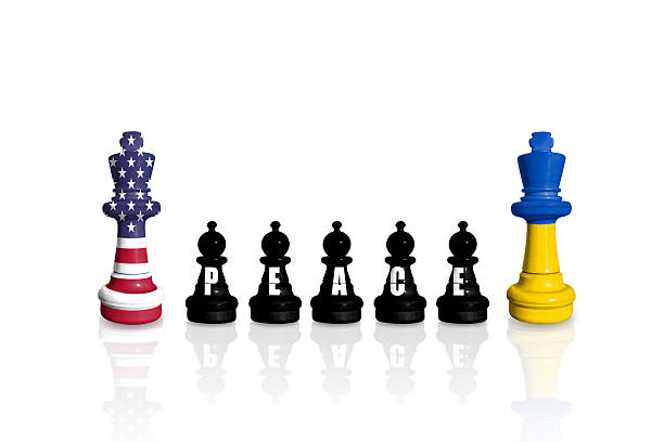 istock Chess made from flags of USA and Ukraine with word PEACE 2248037101