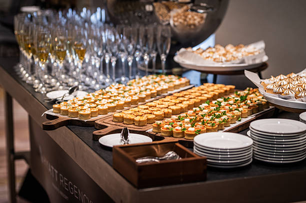 istock Different types of catering canapes on buffet 2248037414