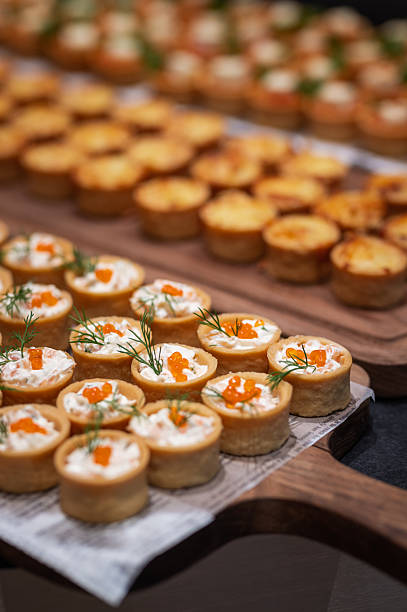 istock Different types of catering canapes on buffet 2248037415