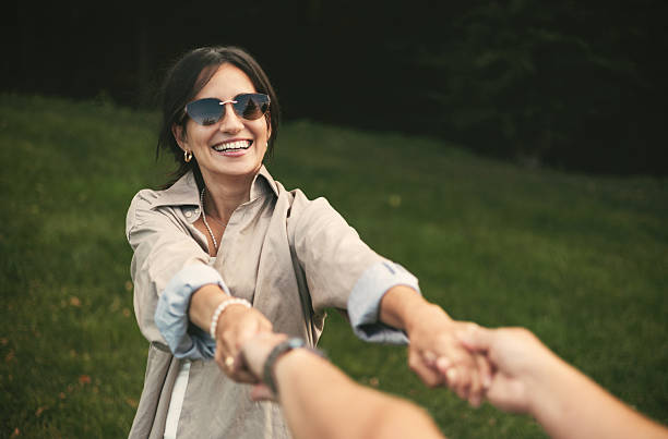 istock Happy laughing woman in the park 2248039332