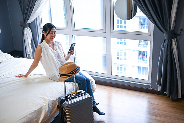 istock Ready for Departure: Traveler Awaiting Her Next Journey 2248042040